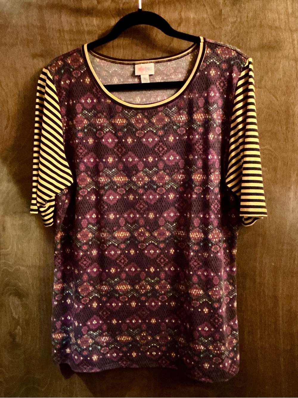 LuLaRoe Purple Patterned Short Sleeve Top with Yellow-Black Striped Sleeves